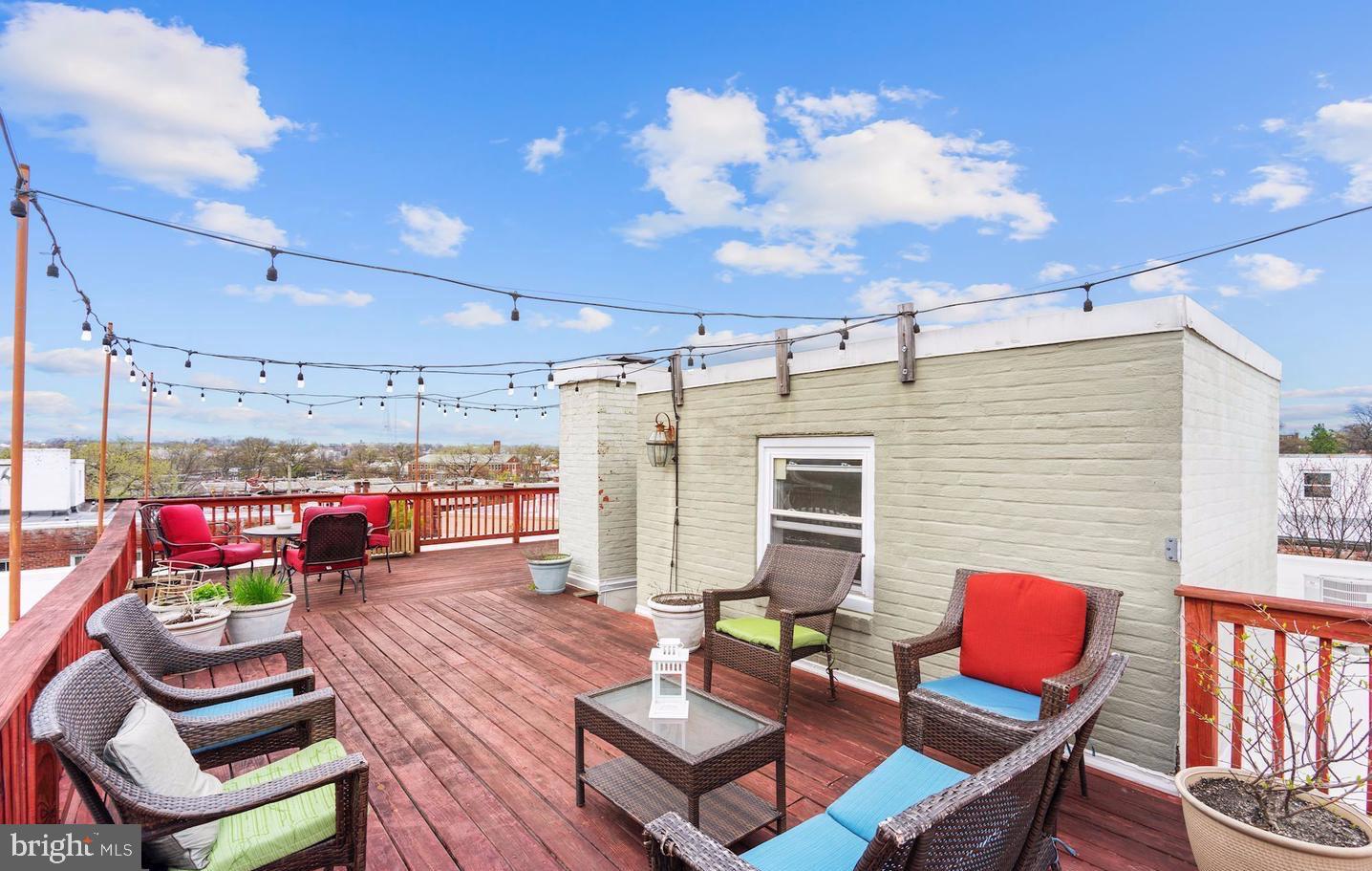 5040 1st Street Northwest, Unit 301 Washington, DC 20011 - Photo 16 of 22 a view of a chairs and table in a patio