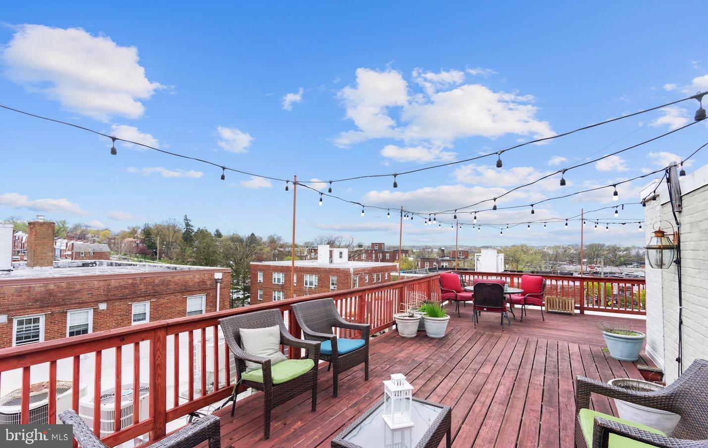 5040 1st Street Northwest, Unit 301 Washington, DC 20011 - Photo 17 of 22 a view of a balcony with wooden floor