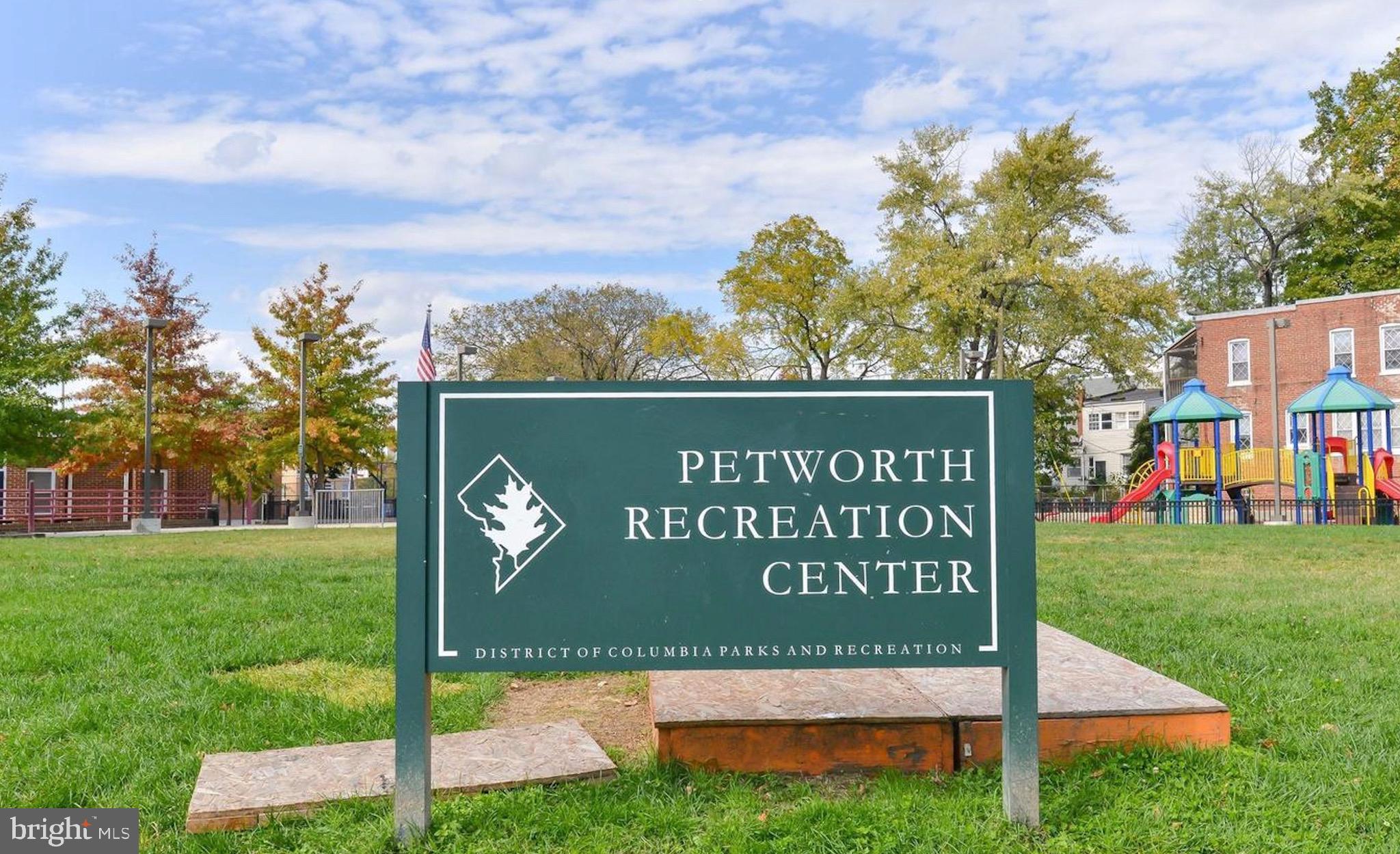 5040 1st Street Northwest, Unit 301 Washington, DC 20011 - Photo 20 of 22 a sign on the side of the road