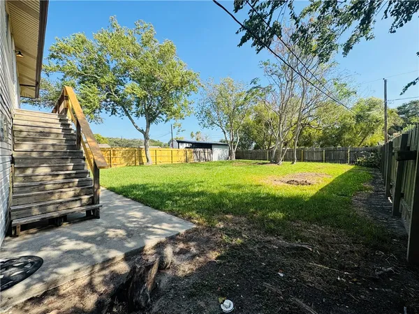a view of a backyard with a garden