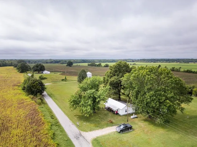 a view of a lake with a yard