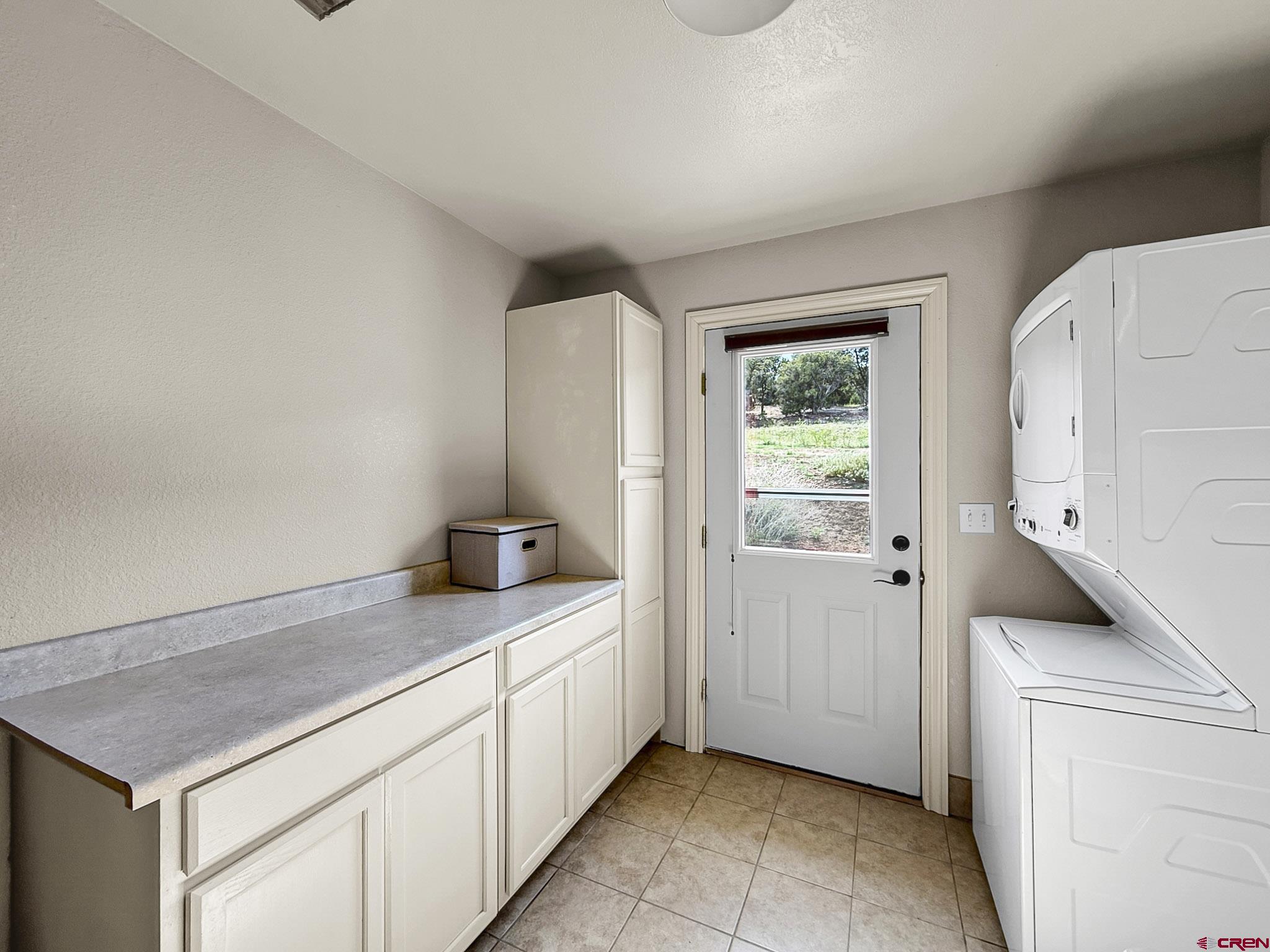 32310 B50 Road Crawford, CO 81415 - Photo 29 of 45 a kitchen with a stove and a cabinets