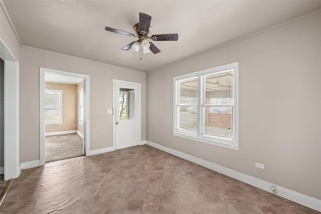 an empty room that has a window