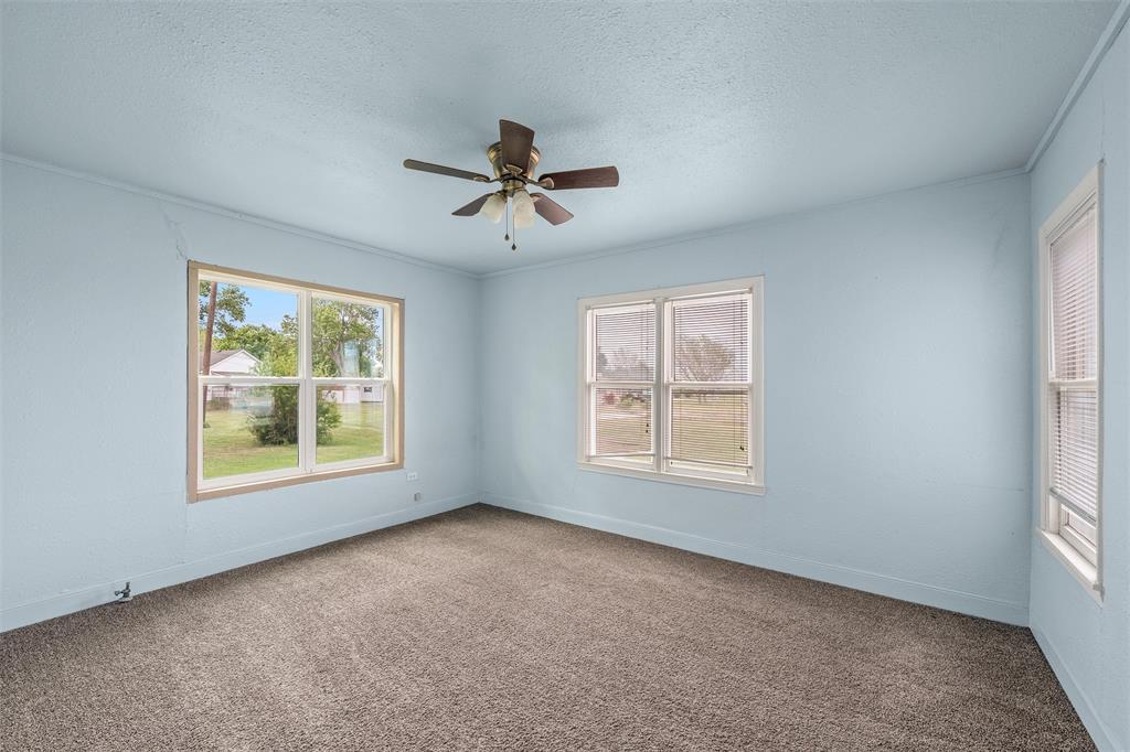 731 Highway 320 Lott, TX 76656 - Photo 10 of 16 a view of an empty room with a window