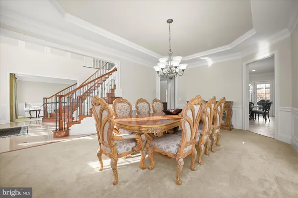 a large kitchen with a large counter top appliances and cabinets