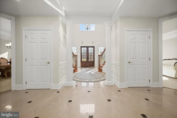 a kitchen with stainless steel appliances granite countertop wooden cabinets and a stove top oven