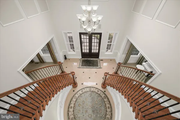 a view of a swimming pool with sitting area