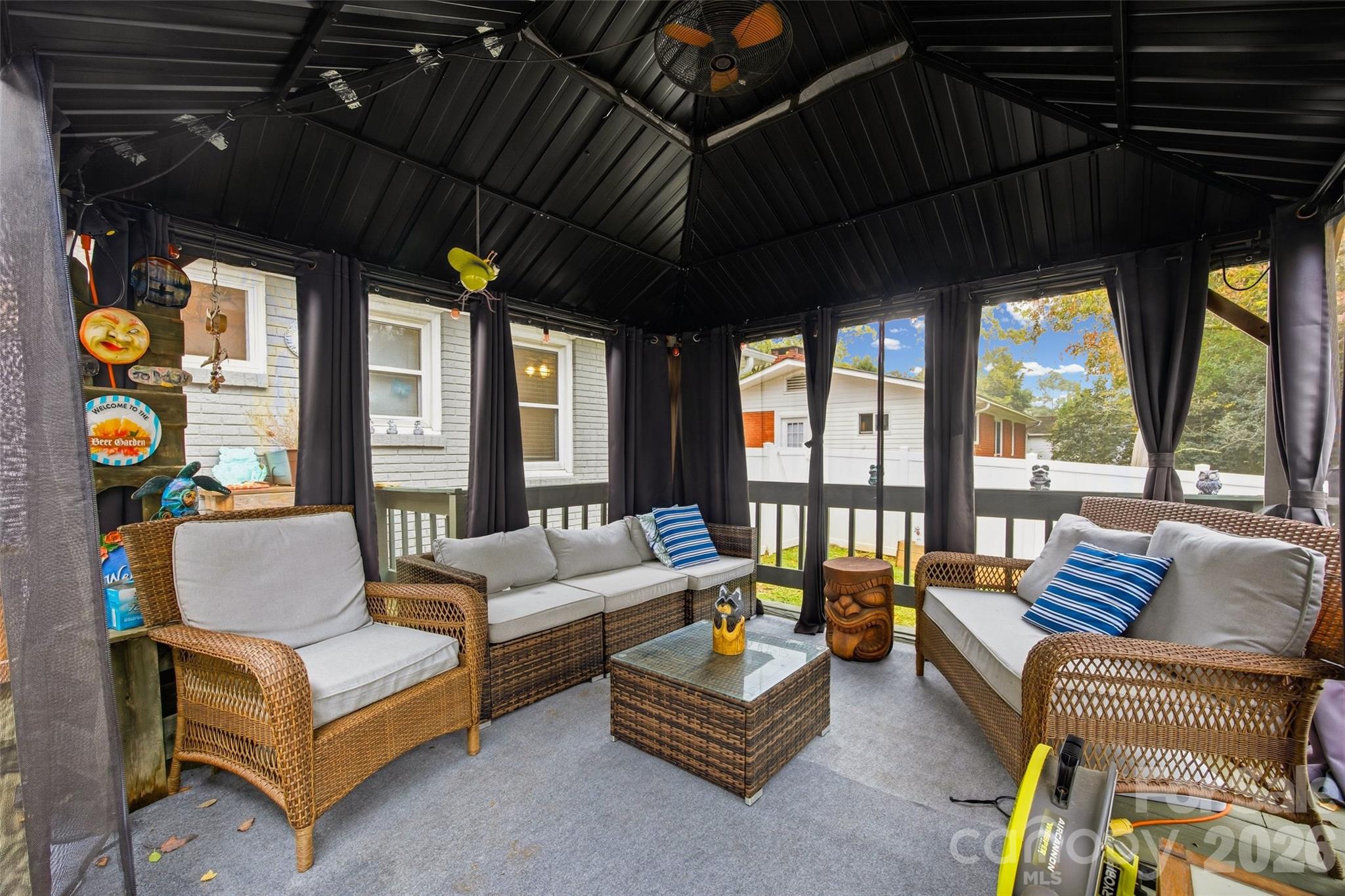 850 Burnley Road Charlotte, NC 28210 - Photo 25 of 38 a living room with furniture and a large window