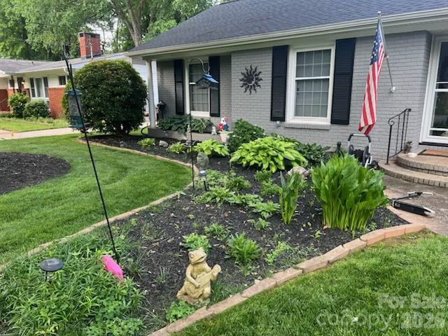 850 Burnley Road Charlotte, NC 28210 - Photo 26 of 38 a house view with a garden space