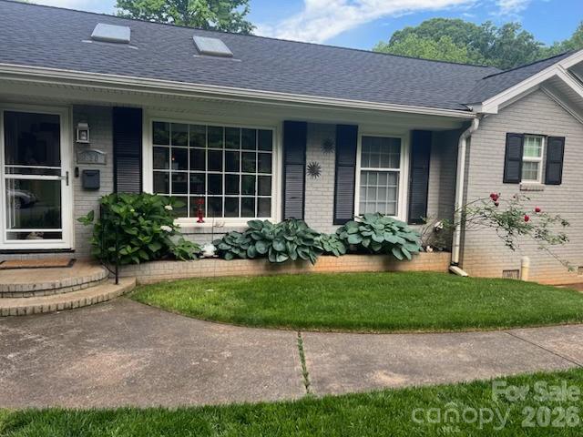 850 Burnley Road Charlotte, NC 28210 - Photo 27 of 38 a front view of a house with garden