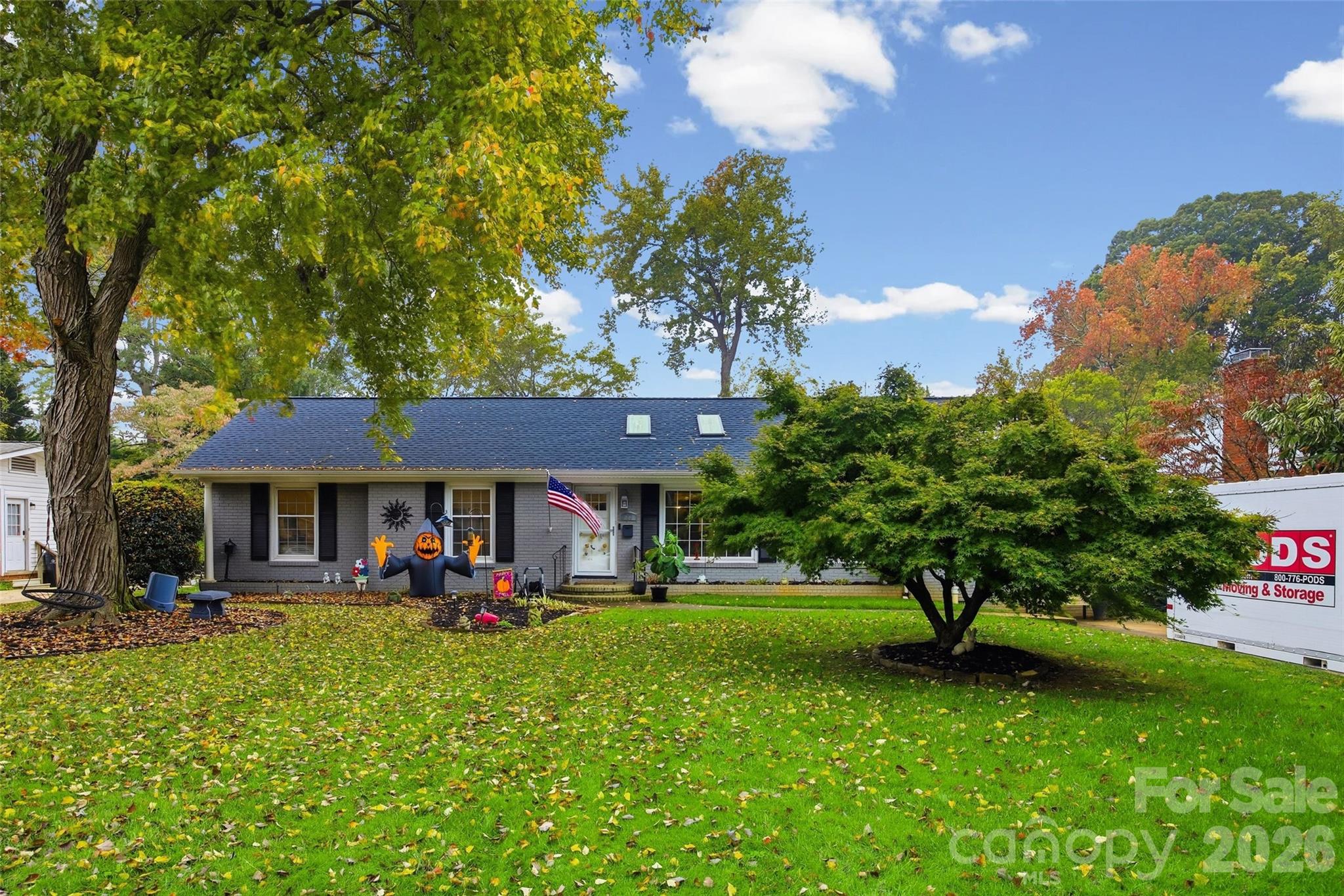 850 Burnley Road Charlotte, NC 28210 - Photo 29 of 38 a view of a park with plants and a bench