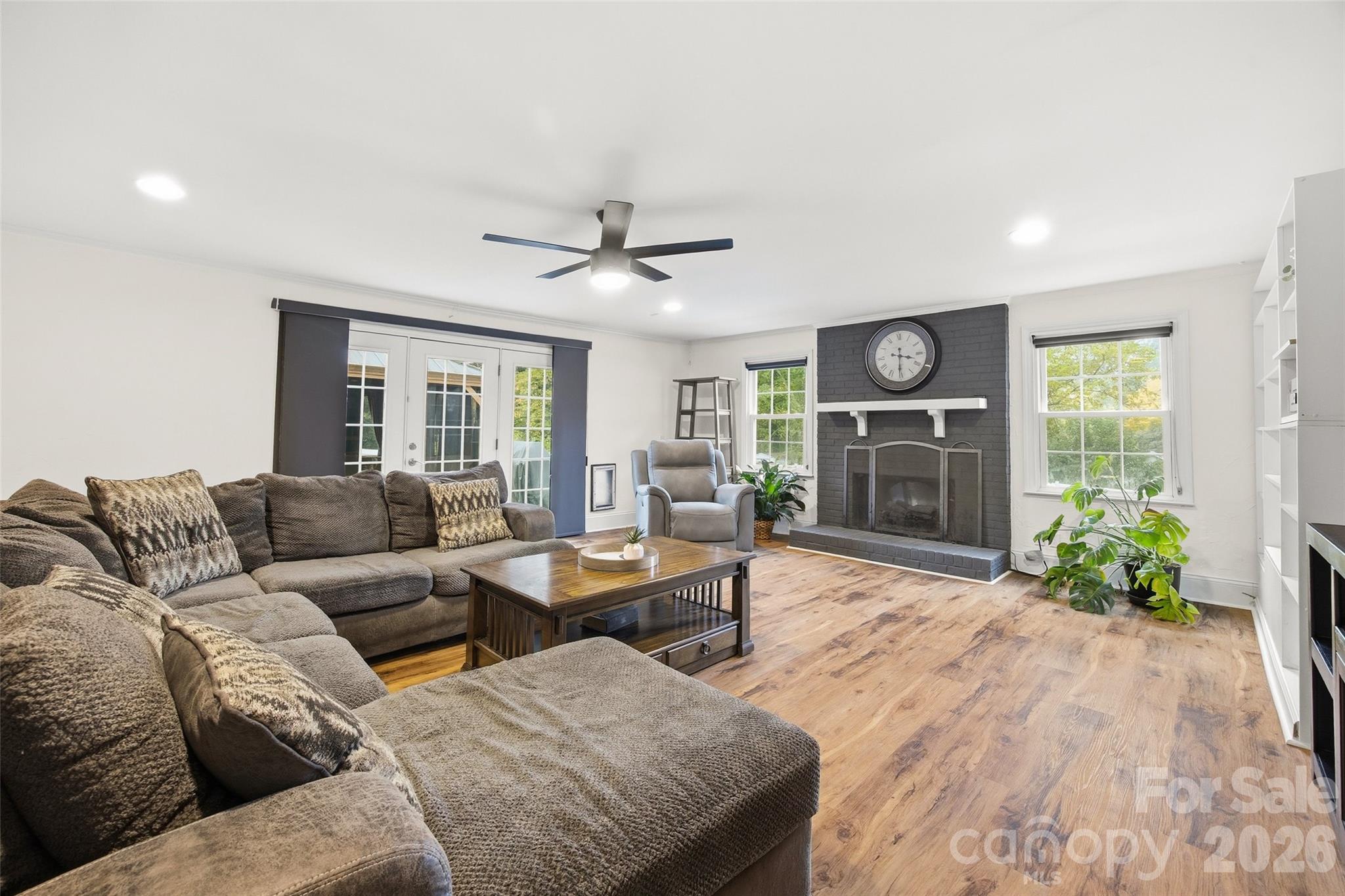 850 Burnley Road Charlotte, NC 28210 - Photo 3 of 38 a living room with furniture and a fireplace