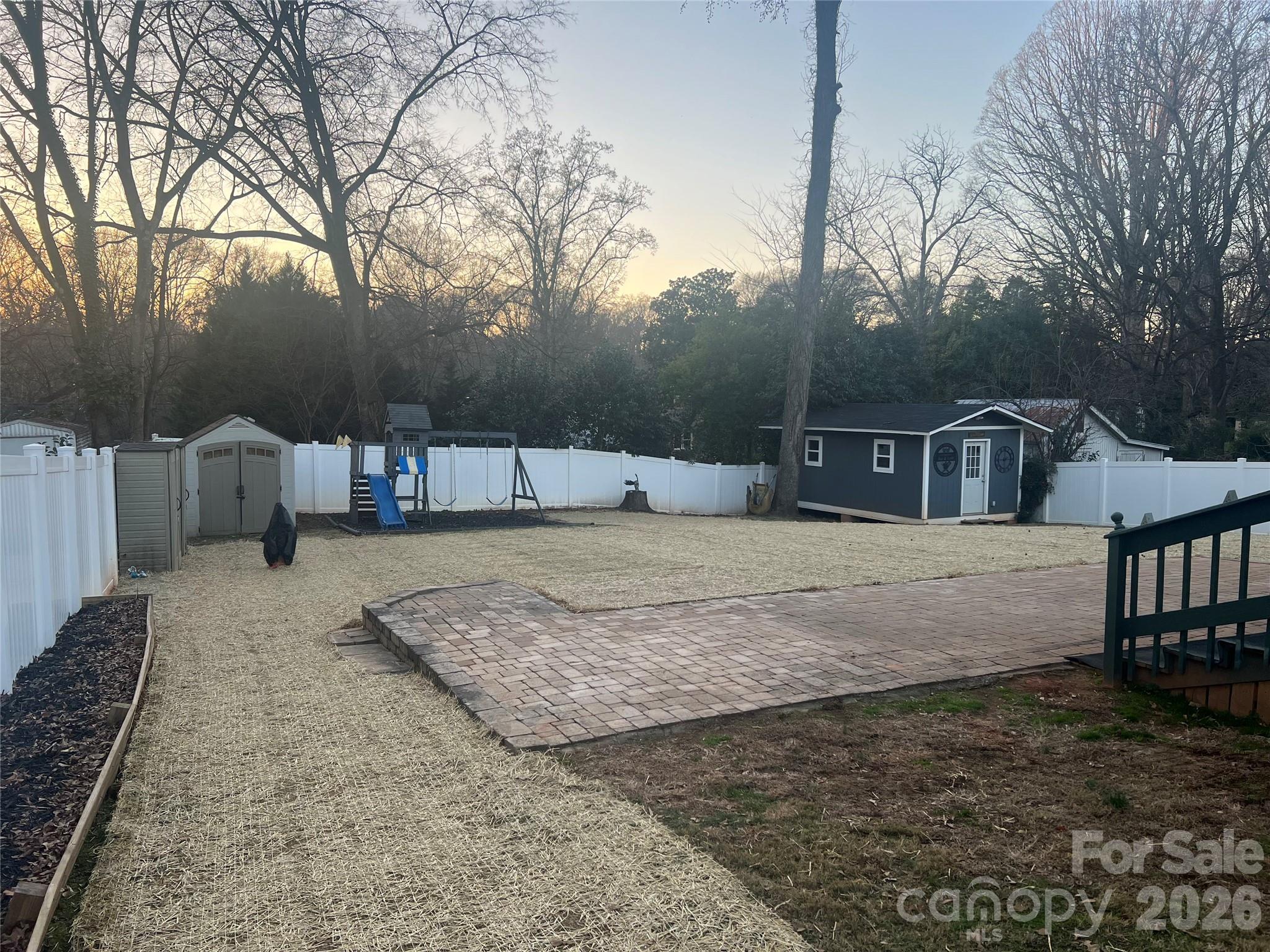 850 Burnley Road Charlotte, NC 28210 - Photo 32 of 38 a front view of a house with a yard