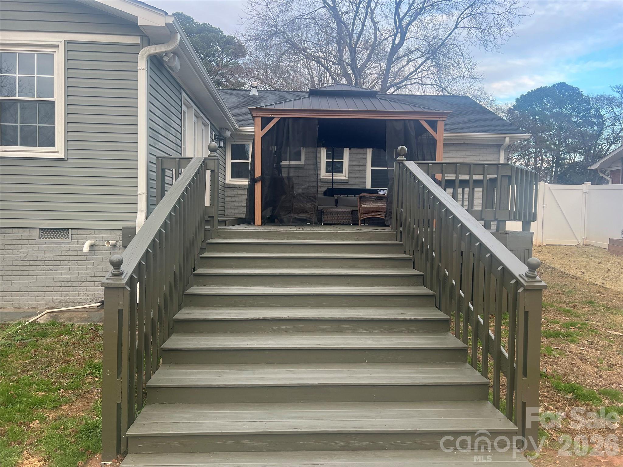 850 Burnley Road Charlotte, NC 28210 - Photo 36 of 38 a view of a house with wooden stairs