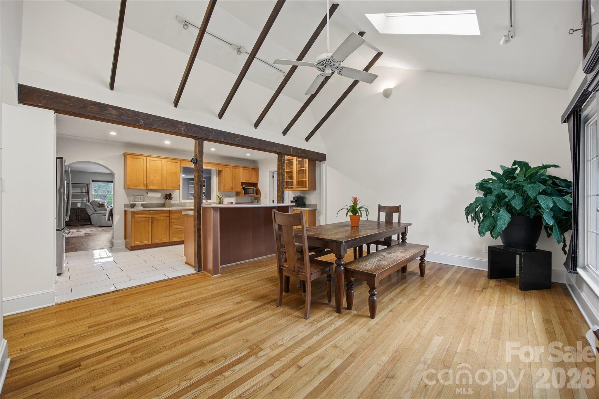 850 Burnley Road Charlotte, NC 28210 - Photo 7 of 38 a view of a dining room with furniture window and wooden floor