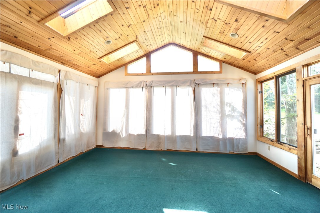 7060 Gates Road Gates Mills, OH 44040 - Photo 16 of 38 Spacious sun room with sky lights and entrance to rear patio.