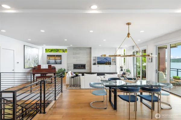 a kitchen with a sink cabinets and wooden floor