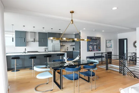 a view of a balcony with chairs