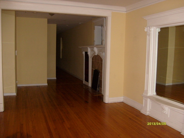 4810 South Prairie Avenue, Unit 2N Chicago, IL 60615 - Photo 4 of 15 a view of a hallway with wooden floor