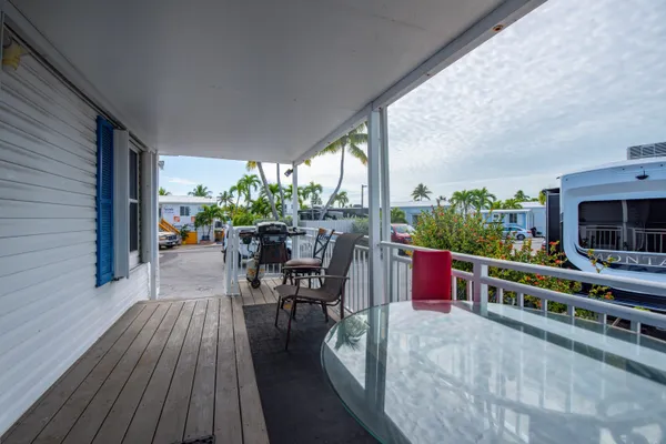 a backyard of a house with seating space