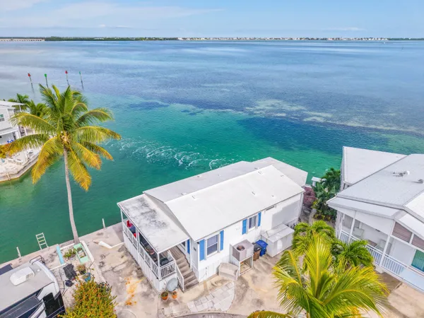 a view of a lake with a big yard