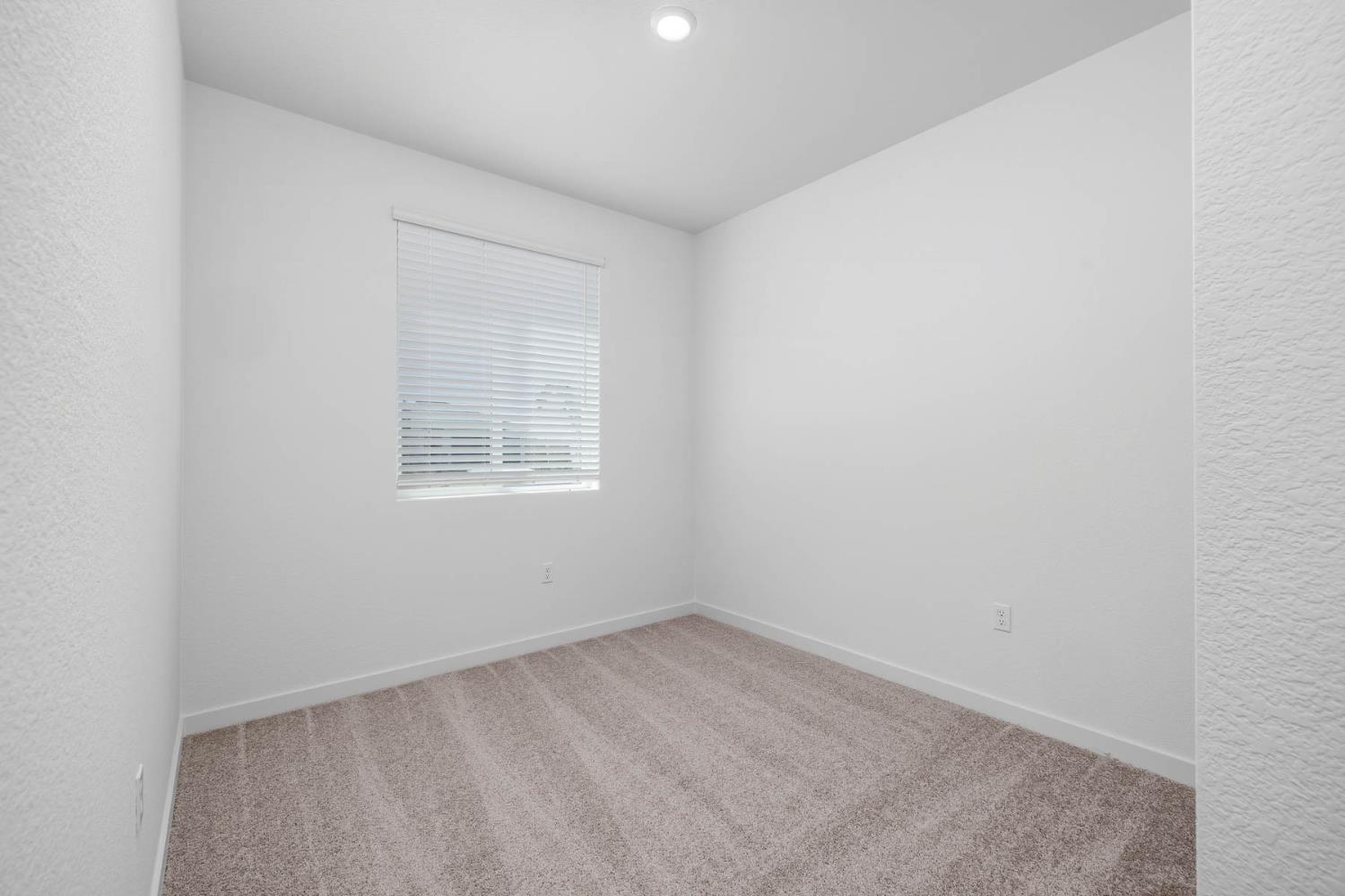 4972 Horner Avenue Stockton, CA 95215 - Photo 11 of 11 an empty room with a window
