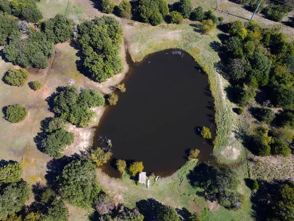 a view of a houses with a yard