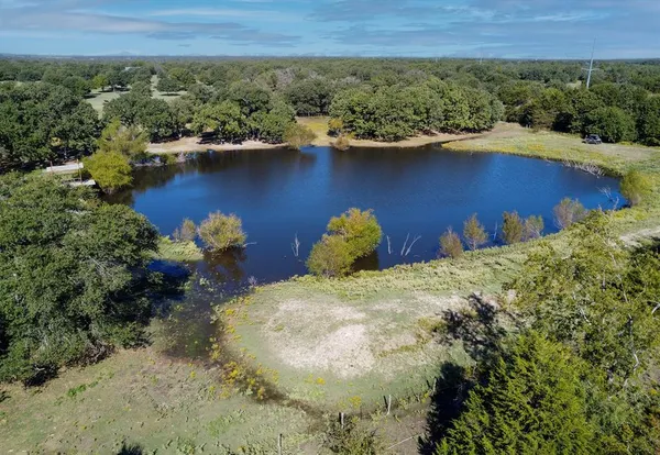 a view of a room with wooden walls