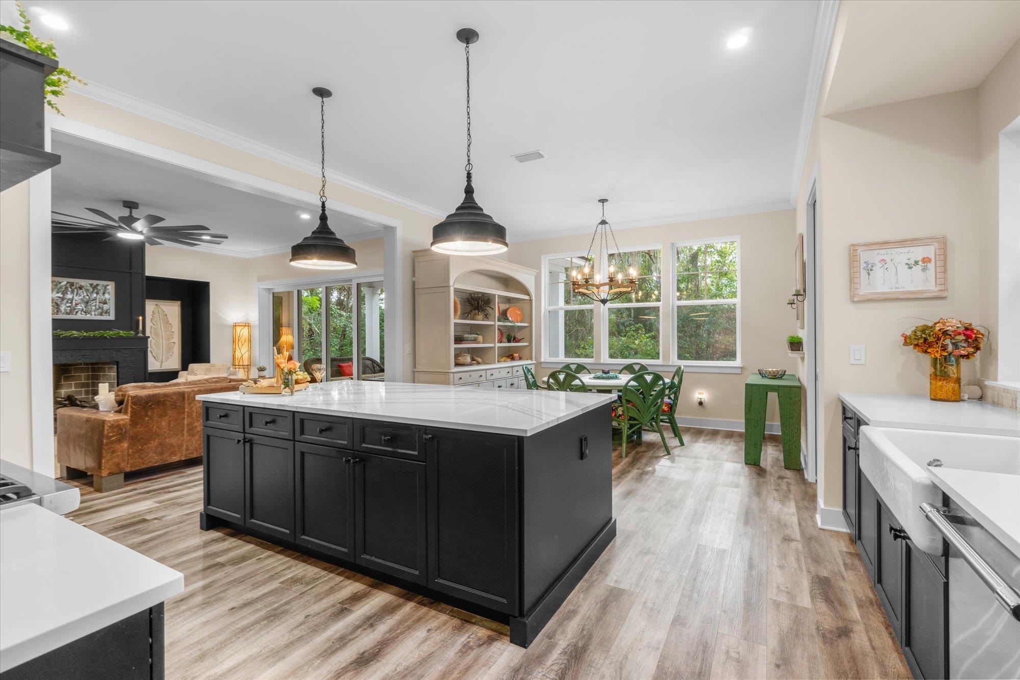 29318 Grandview Manor Yulee, FL 32097 - Photo 20 of 68 a kitchen with stainless steel appliances granite countertop a stove and a wooden floors