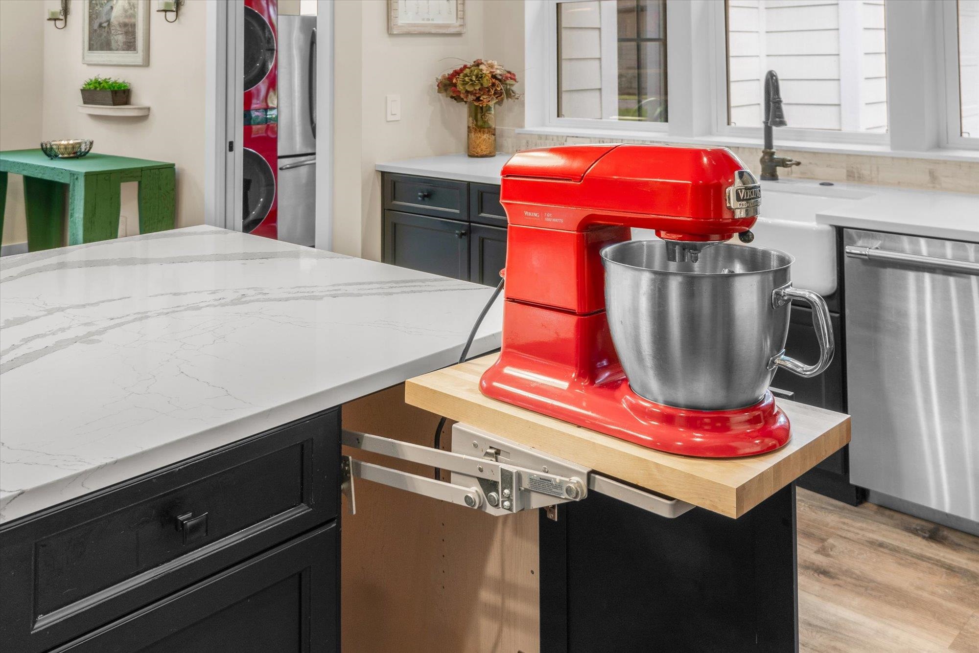 29318 Grandview Manor Yulee, FL 32097 - Photo 22 of 68 Kitchen featuring stainless steel appliances, light stone counters, and estacked washer and dryer