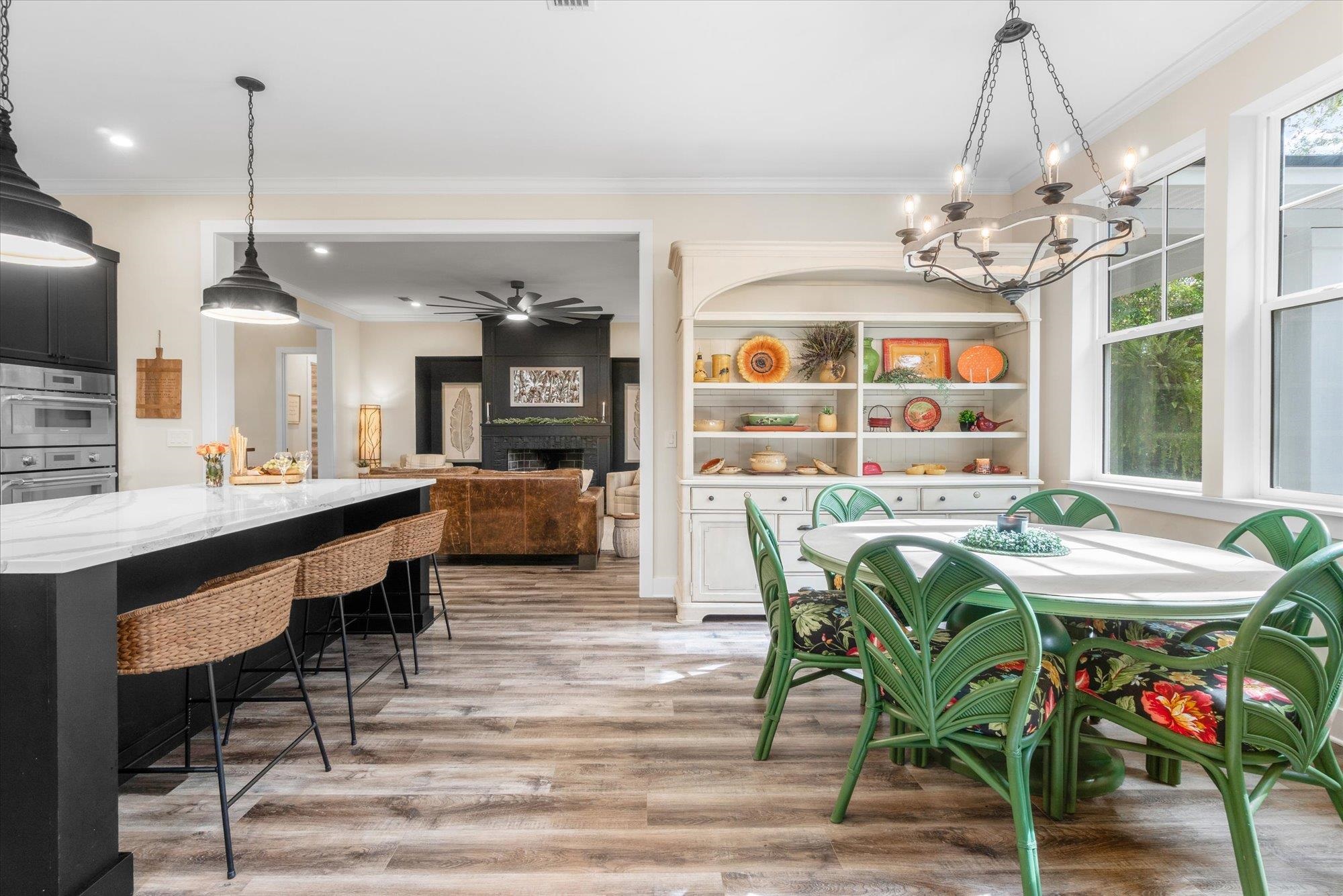29318 Grandview Manor Yulee, FL 32097 - Photo 23 of 68 a view of a dining room with furniture window and wooden floor