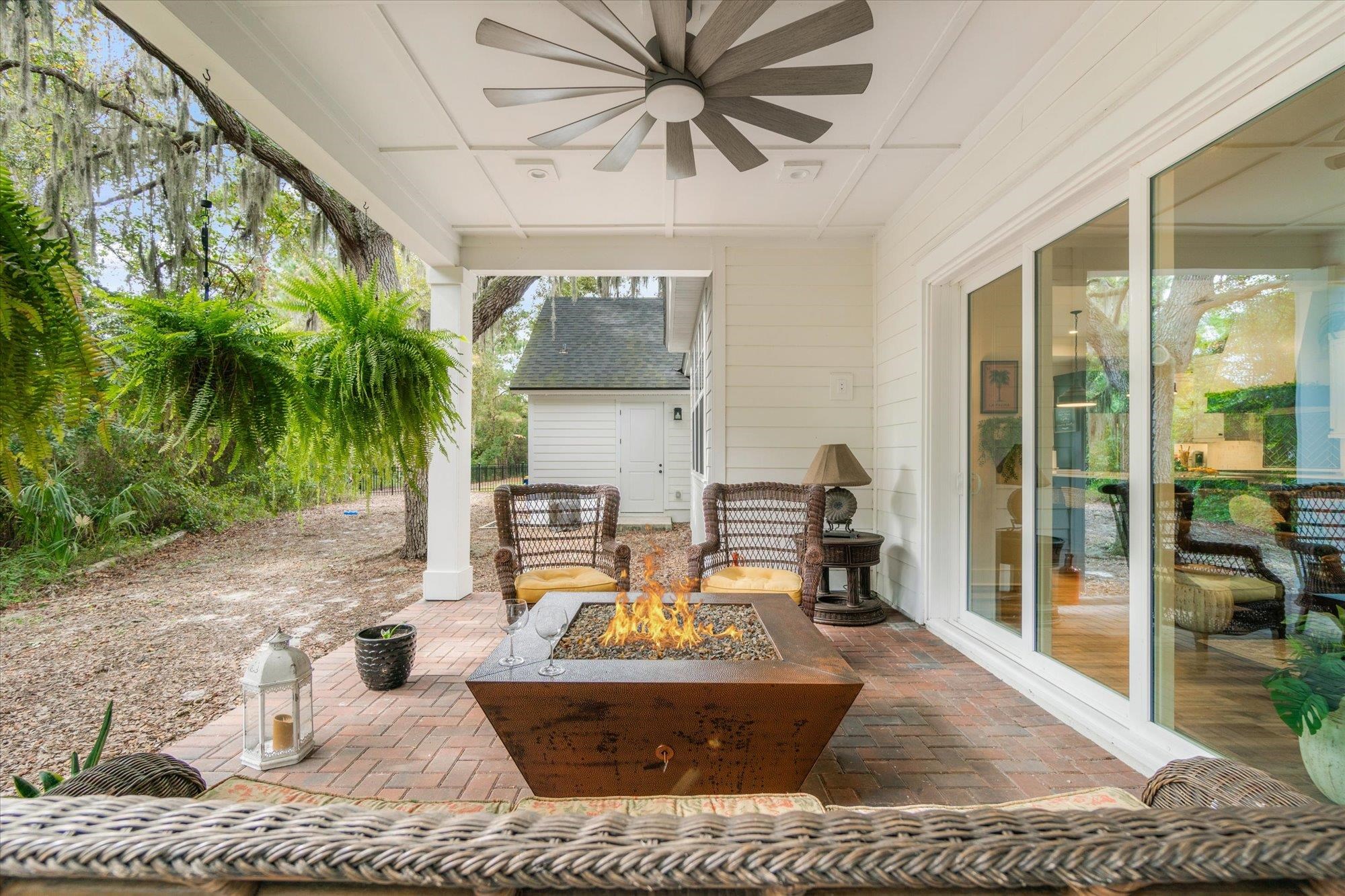 29318 Grandview Manor Yulee, FL 32097 - Photo 28 of 68 View of patio featuring ceiling fan and an outdoor fire pit