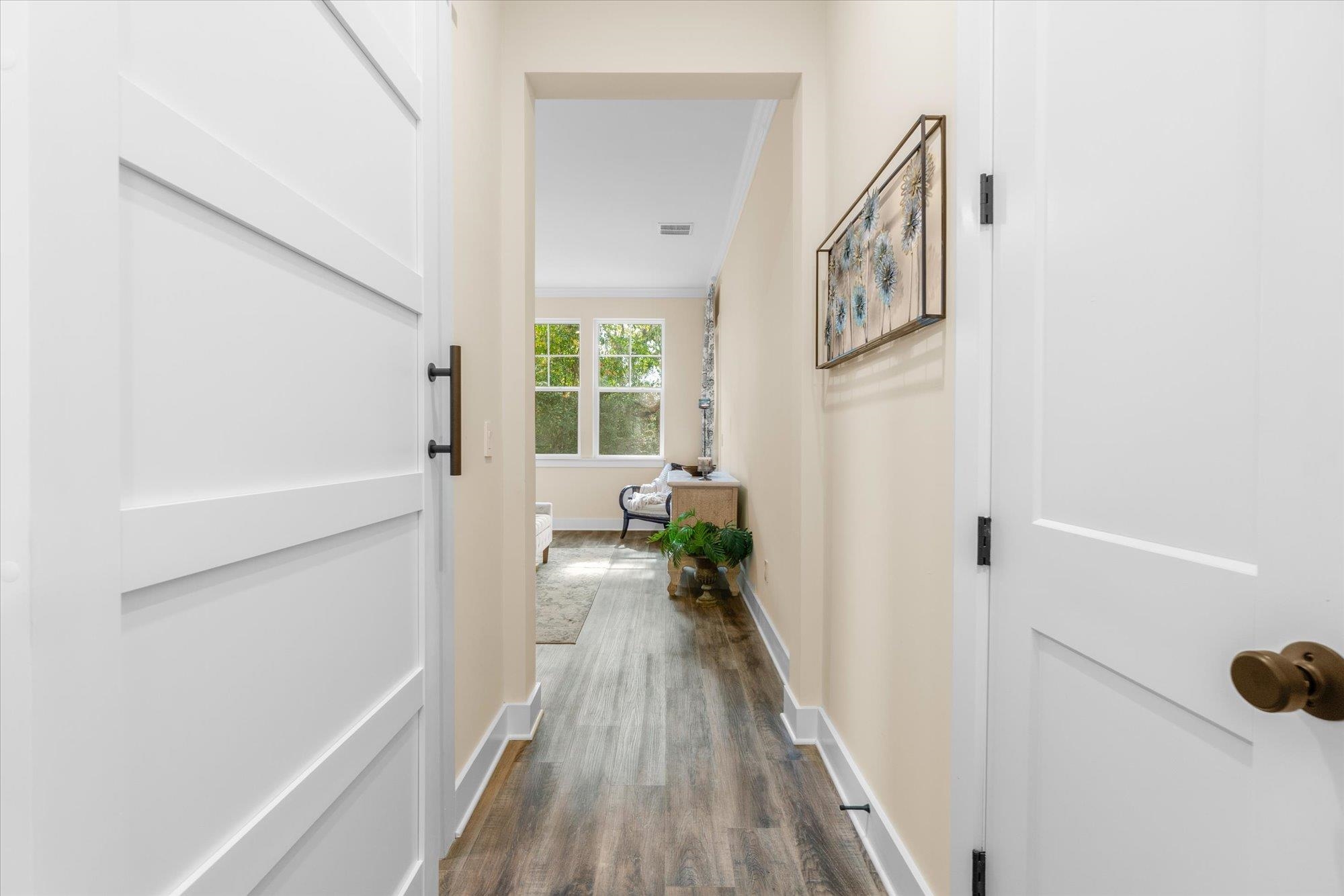 29318 Grandview Manor Yulee, FL 32097 - Photo 30 of 68 a view of a hallway with wooden floor and staircase