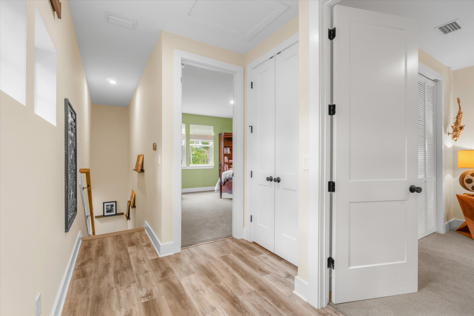 29318 Grandview Manor Yulee, FL 32097 - Photo 38 of 68 Hallway featuring an upstairs landing and light wood-style floors