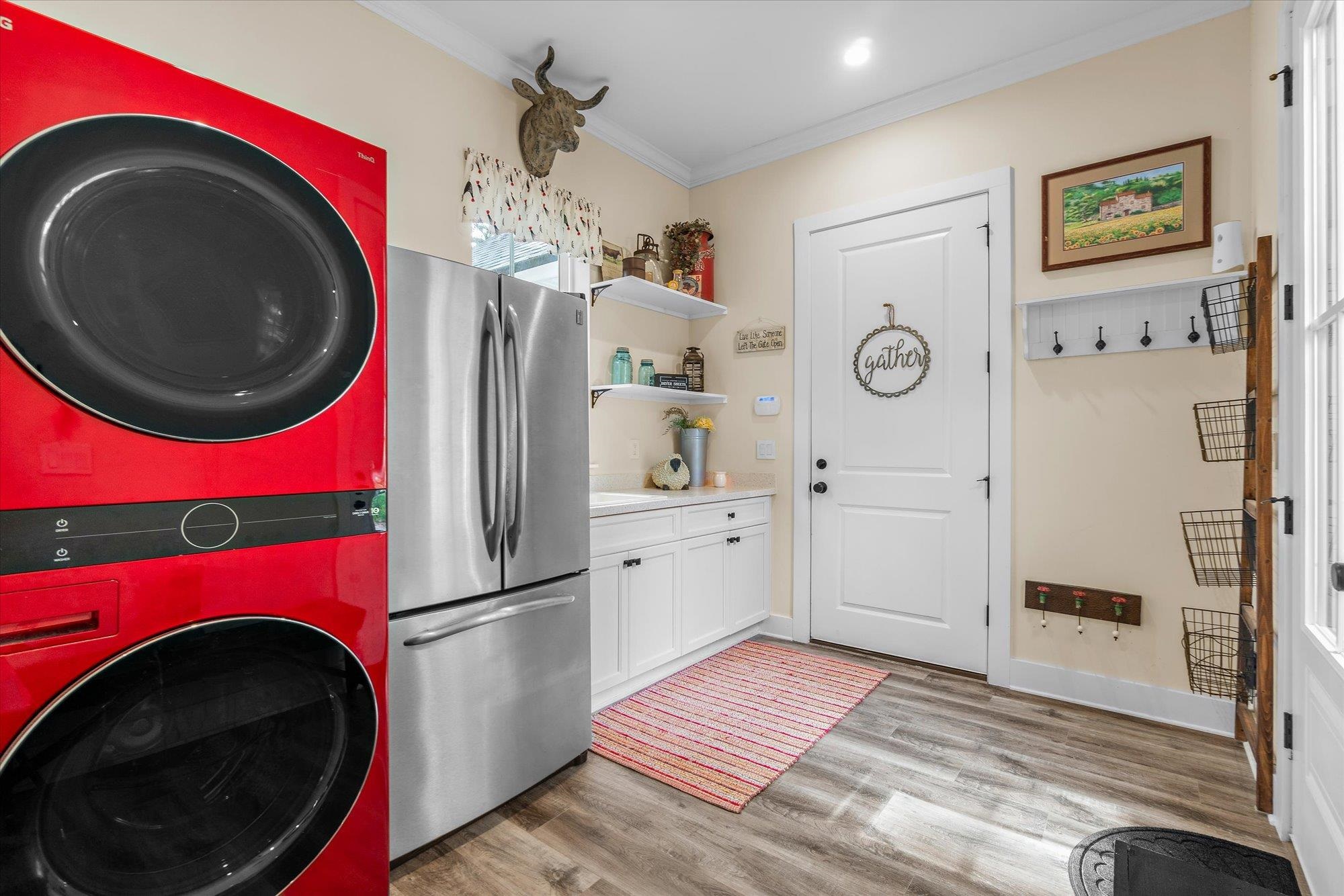 29318 Grandview Manor Yulee, FL 32097 - Photo 42 of 68 a kitchen with a washer and dryer