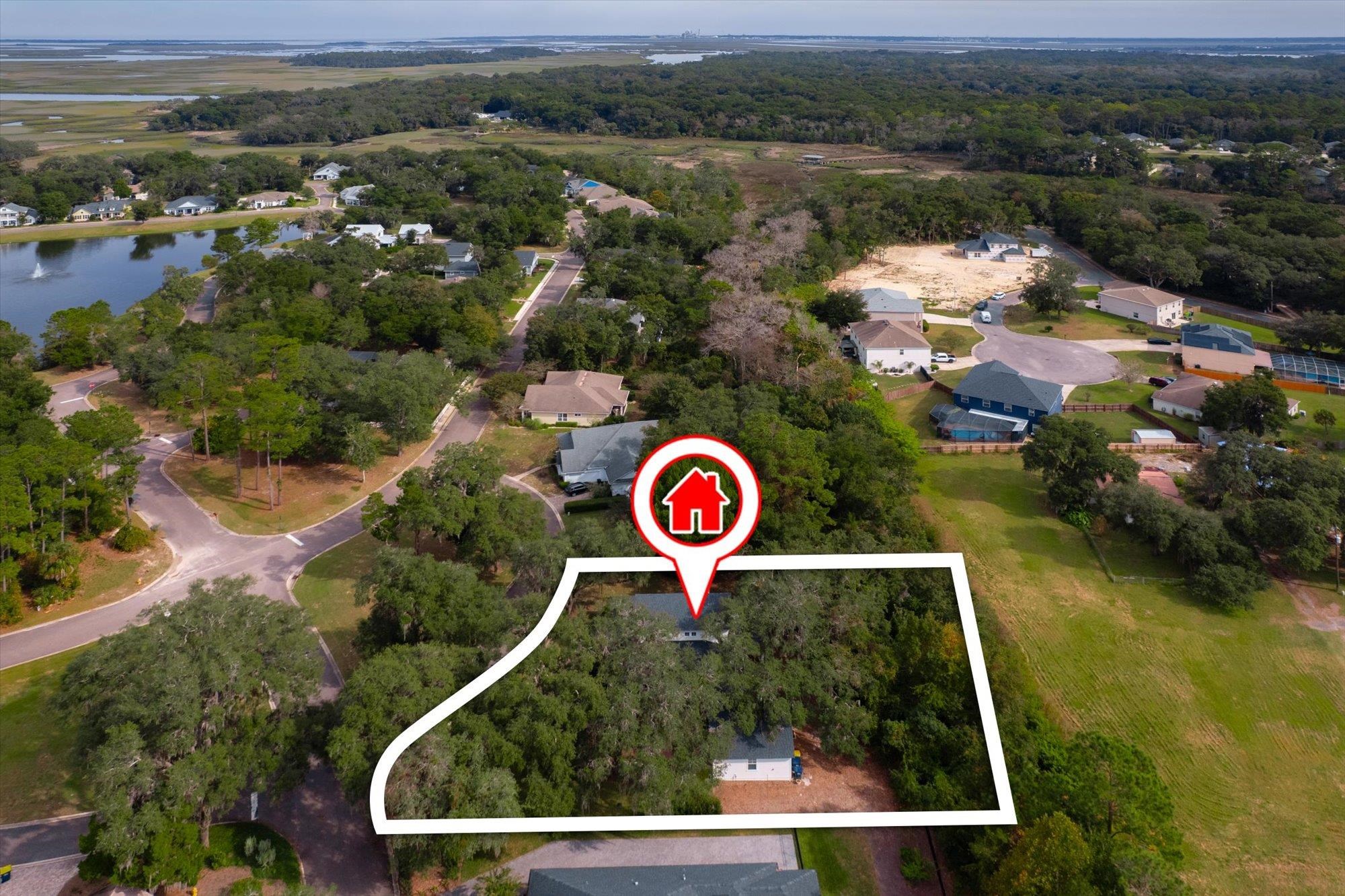 29318 Grandview Manor Yulee, FL 32097 - Photo 47 of 68 Aerial view of property and surrounding area featuring nearby suburban area and property parcel outlined