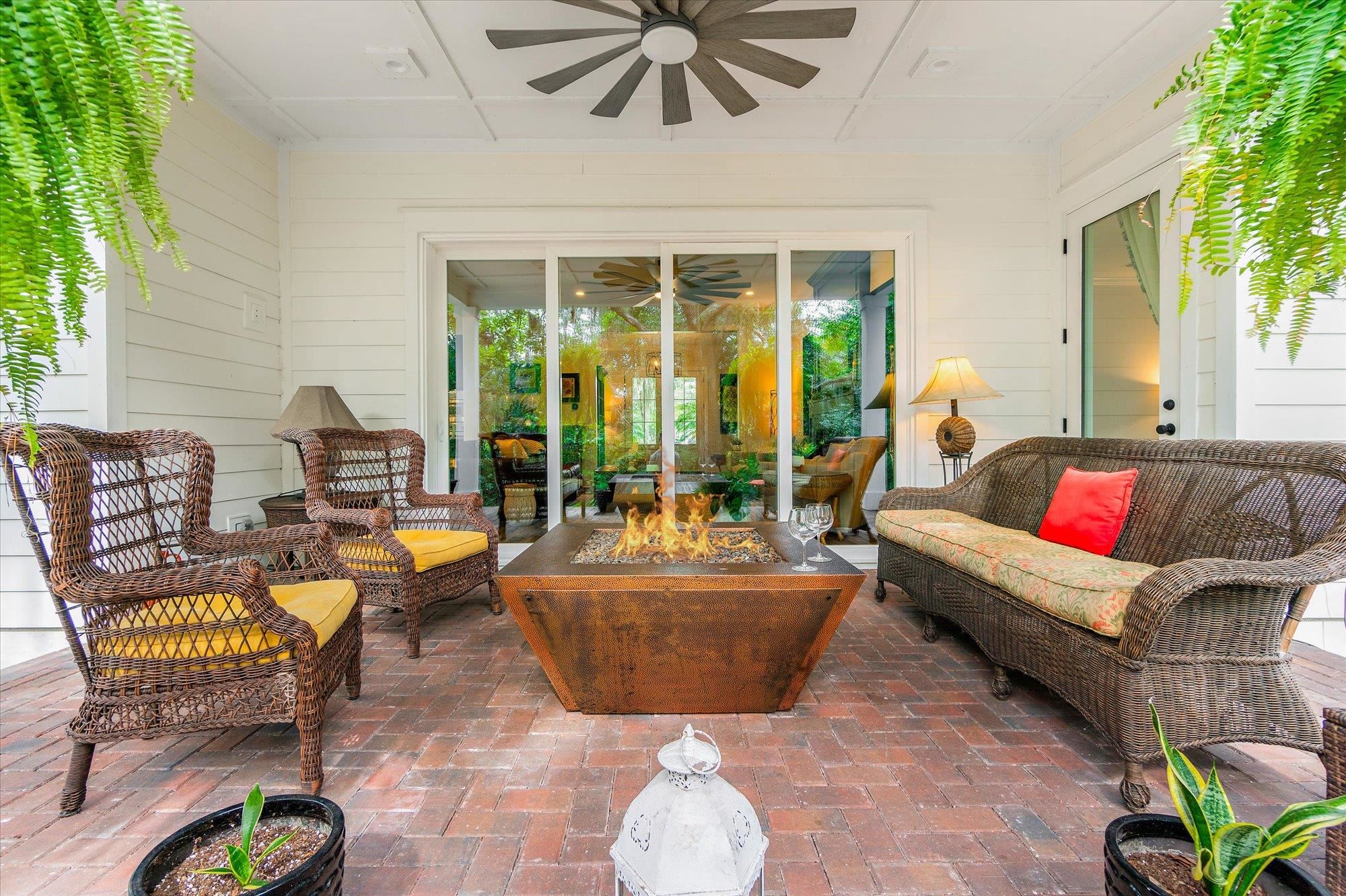 29318 Grandview Manor Yulee, FL 32097 - Photo 5 of 68 View of patio with an outdoor living space with a fire pit and a ceiling fan