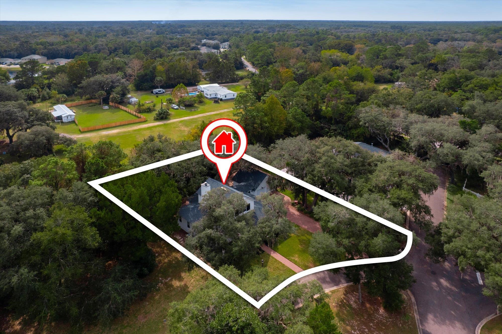 29318 Grandview Manor Yulee, FL 32097 - Photo 52 of 68 Aerial view of property's location with a heavily wooded area and property parcel outlined