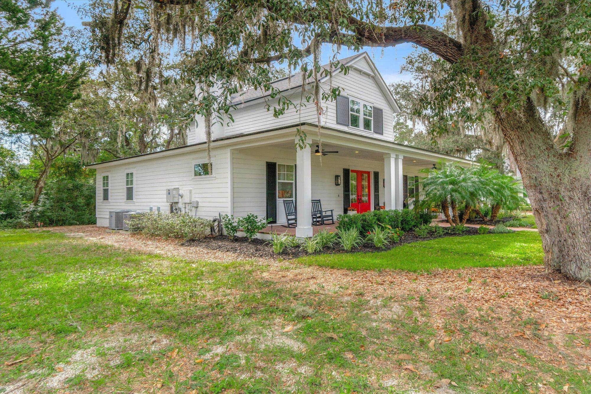 29318 Grandview Manor Yulee, FL 32097 - Photo 54 of 68 View of front facade featuring a front lawn, covered porch, and ceiling fan