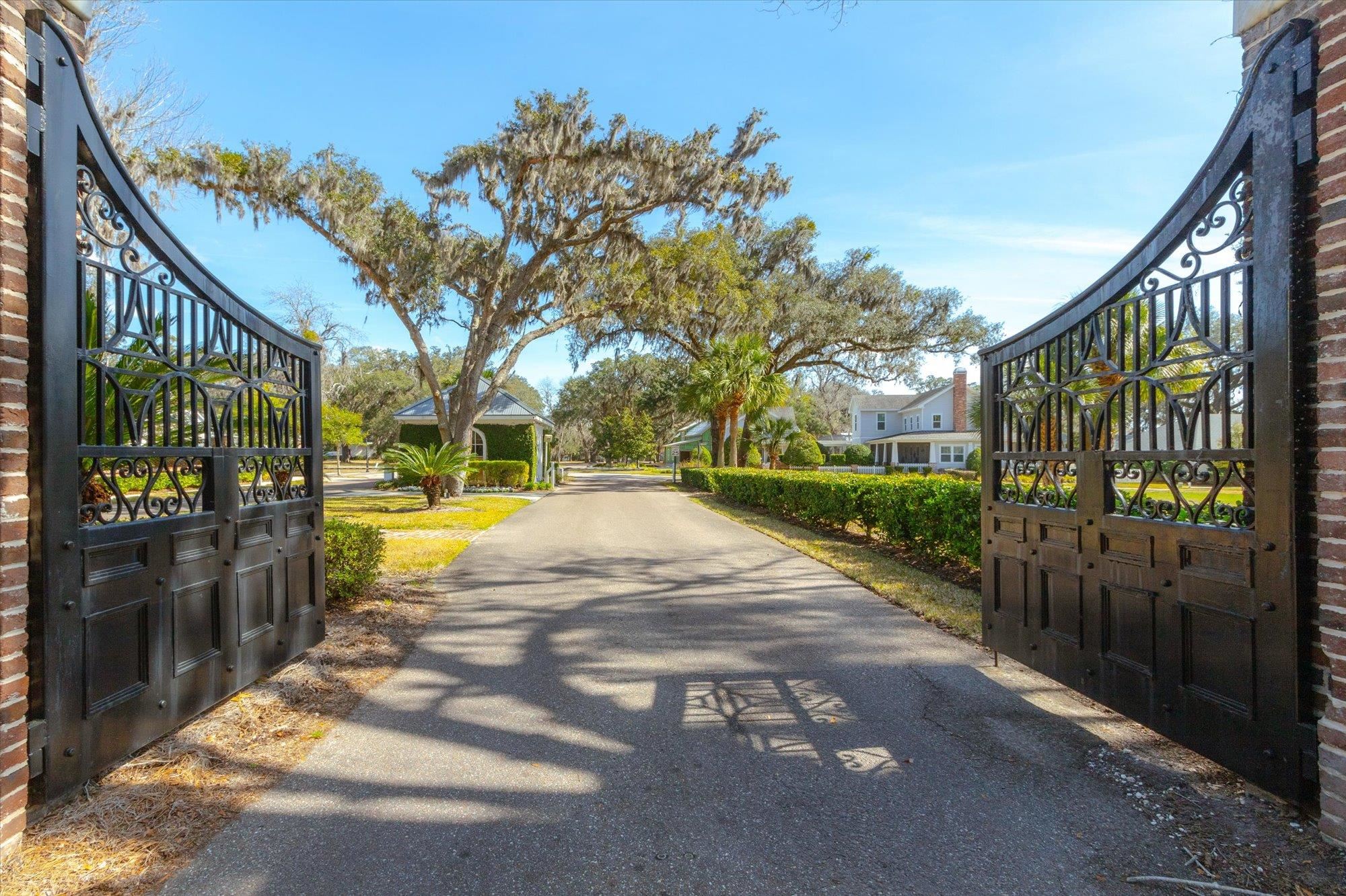 29318 Grandview Manor Yulee, FL 32097 - Photo 64 of 68 View of asphalt road featuring a gate