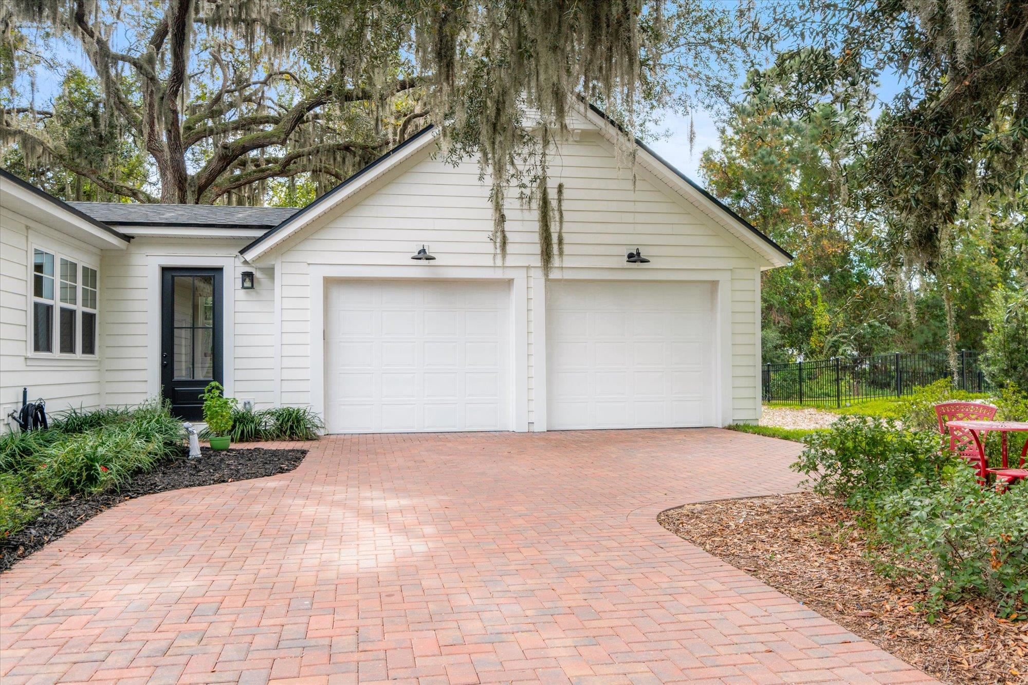 29318 Grandview Manor Yulee, FL 32097 - Photo 9 of 68 Garage featuring decorative driveway
