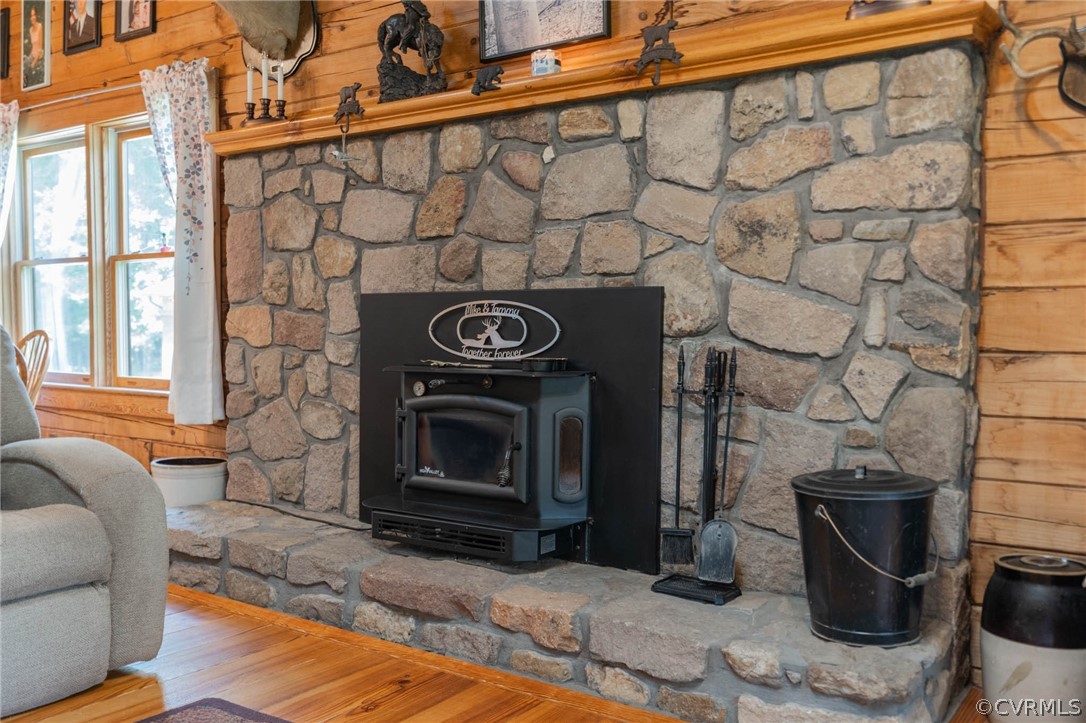17000 Jolly Road Disputanta, VA 23842 - Photo 15 of 50 Stone Fireplace with Wood Stove