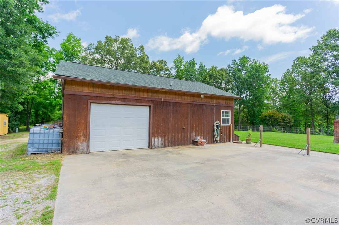 17000 Jolly Road Disputanta, VA 23842 - Photo 35 of 50 One Car Garage with Workshop. Other Half is an In-