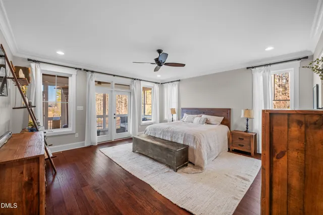 a view of front door deck and wooden floor