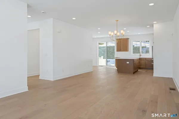 a view of kitchen and a chandelier