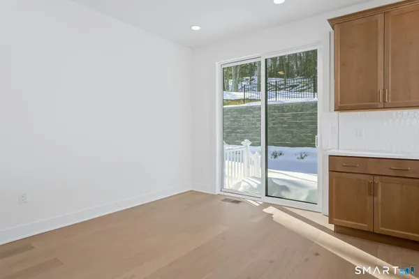 a view of a room with a large window