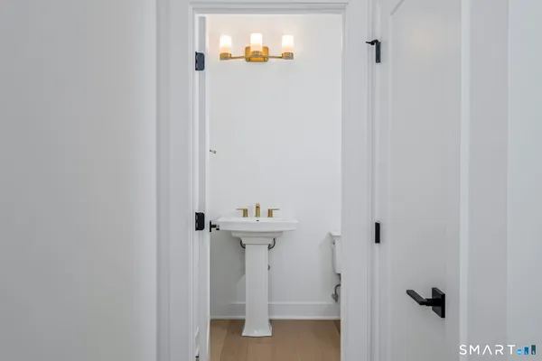 a bathroom with a sink and mirror