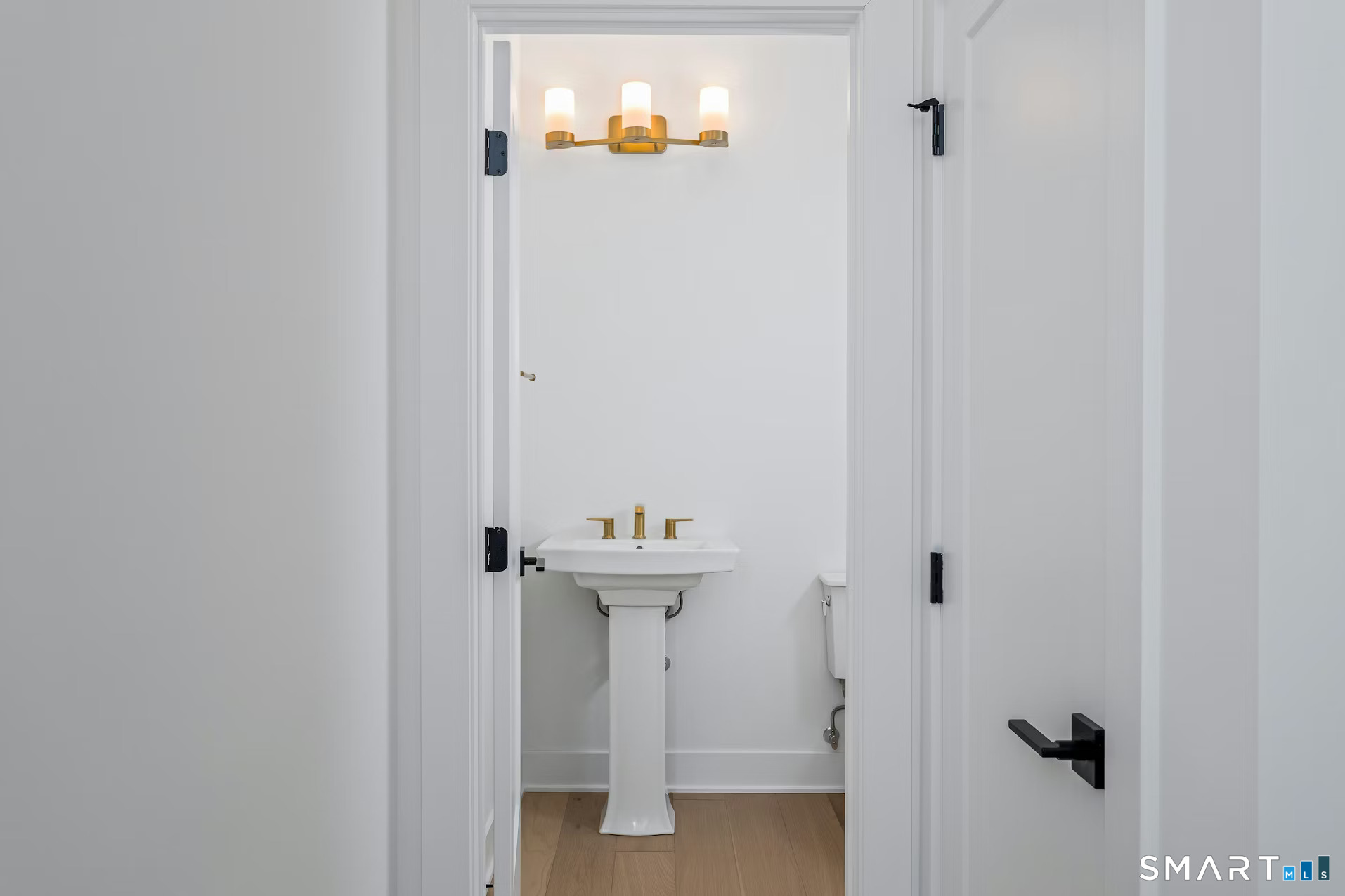 27 Bramble Way Brookfield, CT 06804 - Photo 15 of 26 a bathroom with a sink and mirror