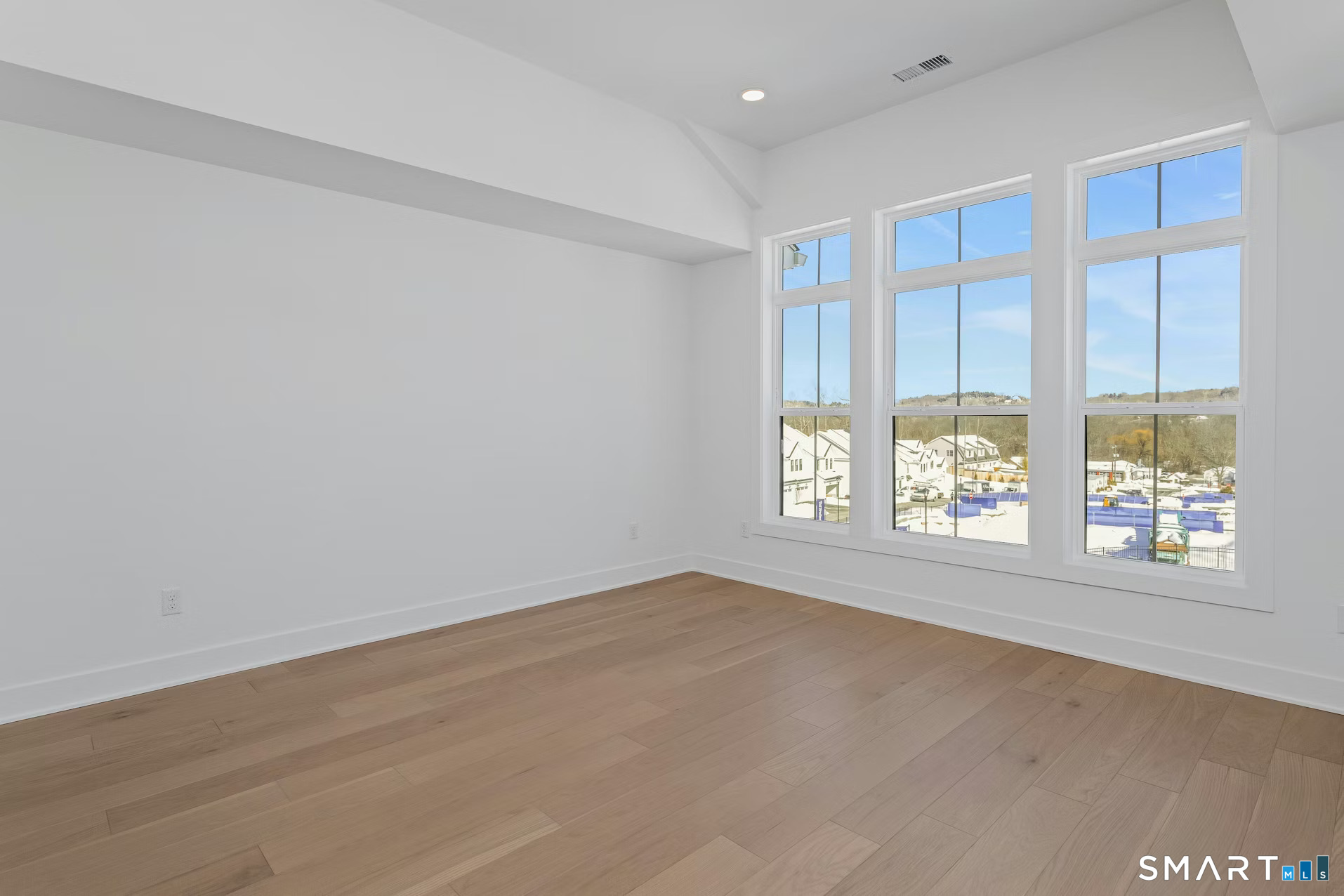 27 Bramble Way Brookfield, CT 06804 - Photo 16 of 26 an empty room with windows and closet