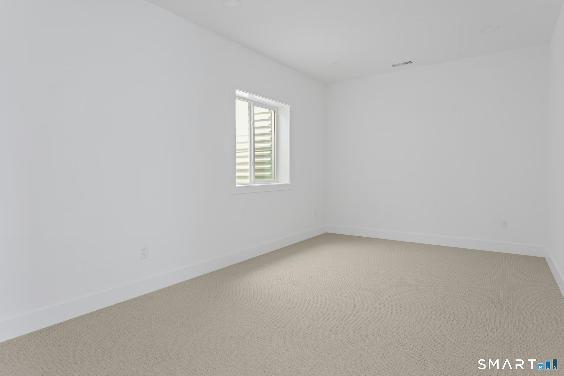 27 Bramble Way Brookfield, CT 06804 - Photo 23 of 26 an empty room with a window